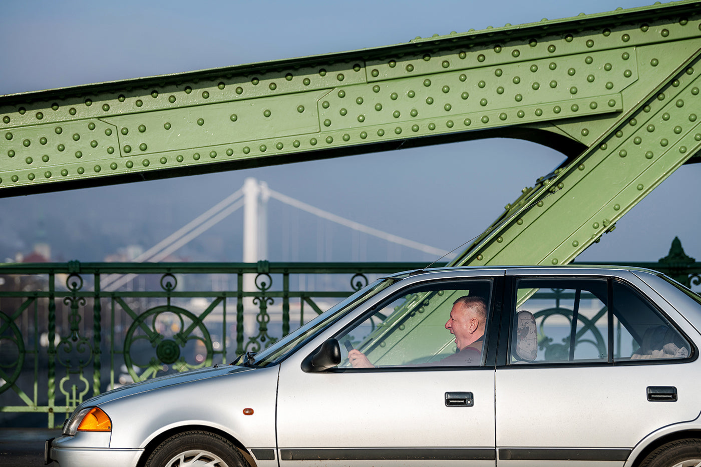 Yawning driver in morning traffic on Liberty Bridge #1198