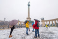 Tourists at Heroes' Square in snowfall #1433