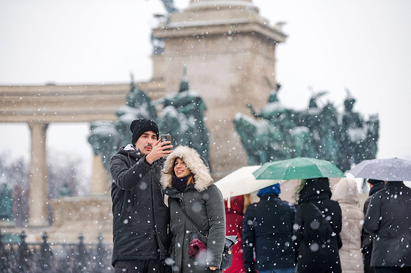 Tourists at Heroes' Square in snowfall #1434