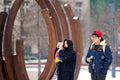 Tourists on March 15th Square in the snow #2201