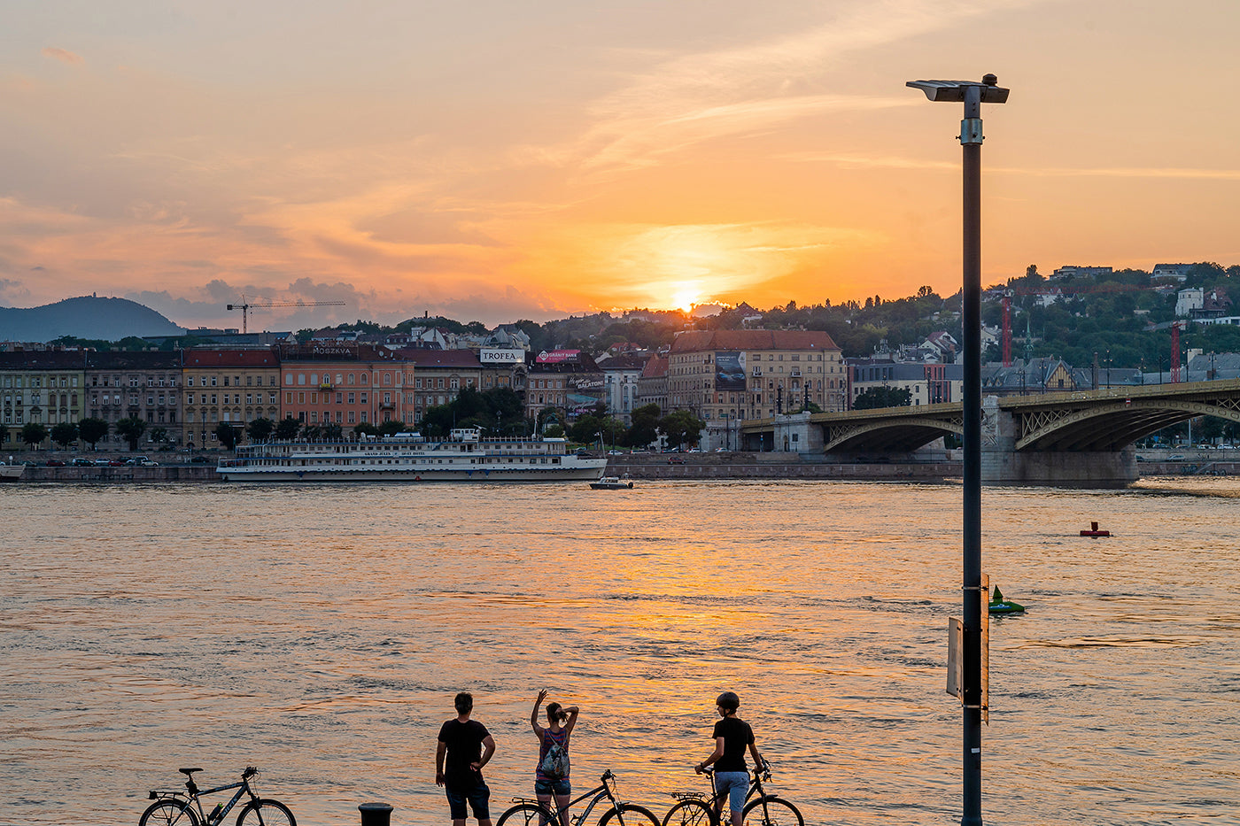 Cyclists on the Danube at sunset #2777