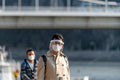 Masked tourists on the Danube bank #3671