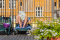 Reading the newspaper in Lukács Bath #3779