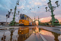 Liberty Bridge by tram at sunrise after rain #4392