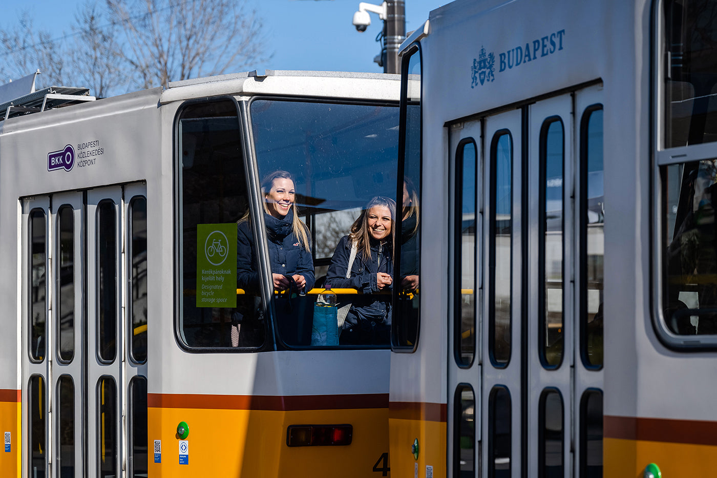 Laughing girls on the tram #5598